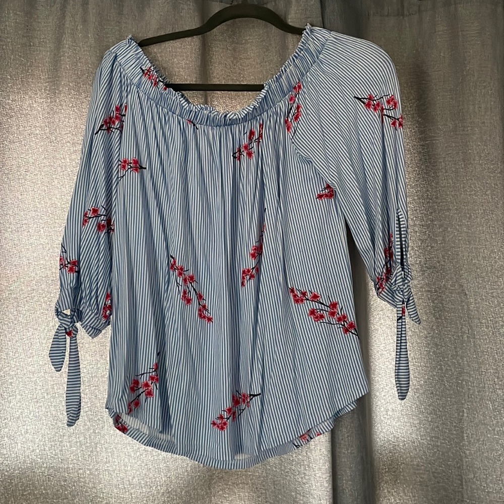 Beautiful off the shoulder blouse.